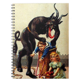 Krampus Kinder in kerstfeestdagen in mandje Notitieboek