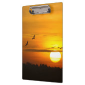 Kranen bij zonsopgang klembord (Links)