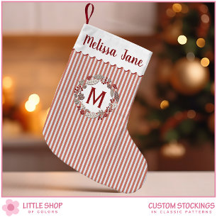 Krans met rode strepen en monogram voor Kerstmis Kleine Kerstsok