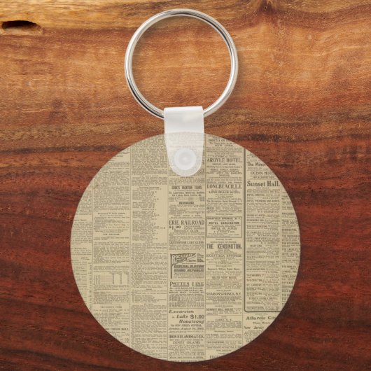 krantenachtergrond sleutelhanger (Voorkant)