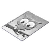 Krantenkoppen in zwart-wit notitieboek (Linkerzijde)