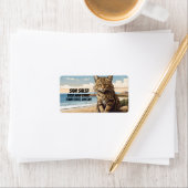 Kretenzische wilde kat op het strand etiket (Insitu)