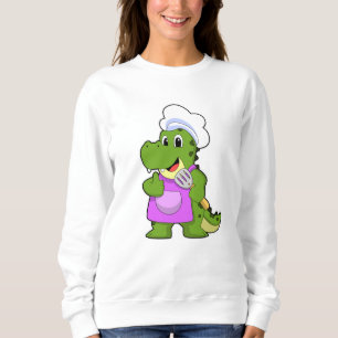 Krokodil als Cook met spatula Trui