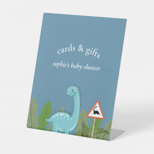 Kruisende dinosauriërs, babyshowerkaarten en -cade reclamebord met voetstuk