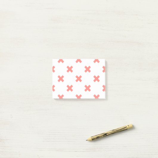 Kruissteek op wit post-it® notes (Op bureau)