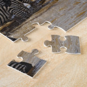 Kudde Burchell's zebra's drinkend uit Mara Legpuzzel (Zijkant)