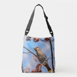 Kuiftoerist met helder blauwe lucht crossbody tas