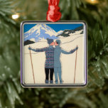 Kunst Deco, Lovers in Snow door George Barbier Metalen Ornament<br><div class="desc">illustratiekunst deco liefde en romance ontwerp met een man en een vrouw die zoenen op de skipistes van een mooi oord. Een jong koppel op vakantie kus op een sneeuw bedekte berg in de winter. L'Hiver (ook bekend als Winter: Lovers in the Snow) van kunstenaar George Barbier,  1925.</div>