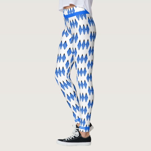 Kunstdeco-element in blauwe Leggings (Links)