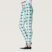 Kunstdeco-elementen in blauwgroen groen leggings (Links)