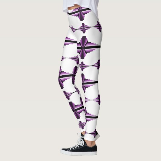 Kunstdeco-elementen in donkere leggings (Links)