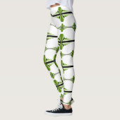 Kunstdeco-elementen in moss groene leggings (Links)