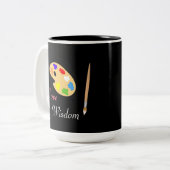 Kunstpalet met verfpenseel en tekst op zwart tweekleurige koffiemok (Voorkant links)