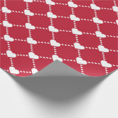 Kunstschattige cadeau van liefde wit op rood cadeaupapier (Hoek)