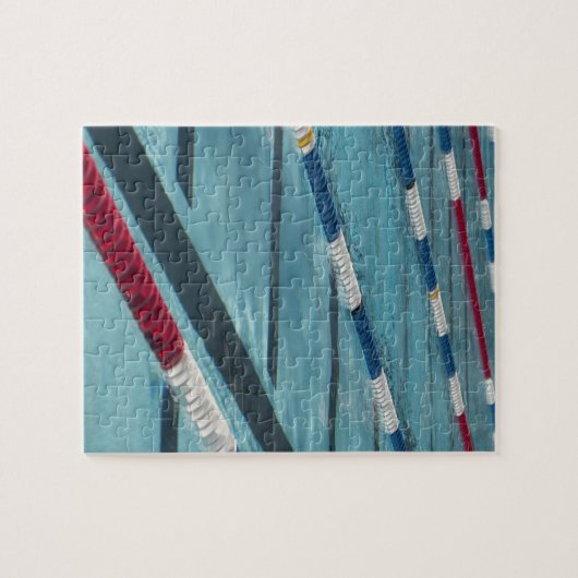 Kunststofscheiders in een zwembad legpuzzel (Horizontaal)