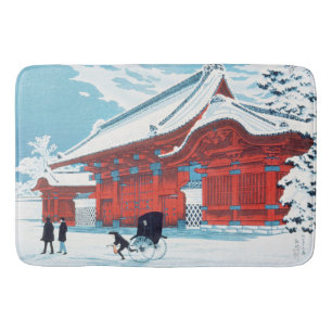 Kunstwerk met oude Japanse rode poort in wintersne Badmat