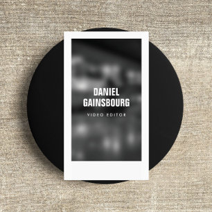 Kunstzinnig ingelijste fotograaf, video zwart/wit visitekaartje