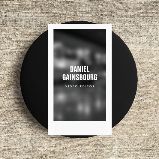 Kunstzinnig ingelijste fotograaf, video zwart/wit visitekaartje