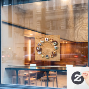 Kups van zwarte koffie met bonen als klok raamsticker