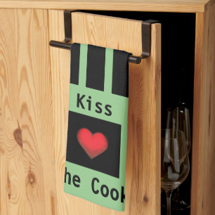 Kus de keukenhanddoek van Cook