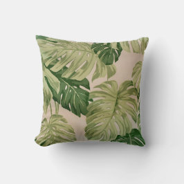kussen met groen bladeren