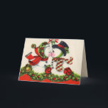 kussen paar kerst Kaart<br><div class="desc">Schattige sneeuwkoppel zoenen onder de maretak. Retro kerstkaarten voor de mensen van wie je houdt. Makkelijk aan te passen! Elke charmante kaart is liefdevol gerestaureerd voor de beste afdrukkwaliteit.</div>