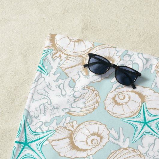 kust turquoise zandstrand Monogram Strandlaken (In situ)