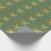 Kustkerstaarvis op groen cadeaupapier (Hoek)