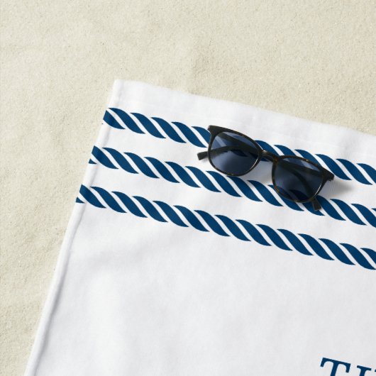 Kustkreeft familie vakantie aan zee strandlaken (In situ)