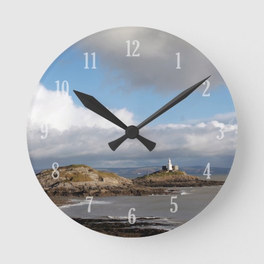 Kustlandschap en vuurtoren ronde klok (Voorkant)