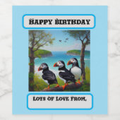 Kusttrio: drie papegaaiduikers op het strand in ol wijn etiket (Enkel label)