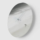 Kustzandloper op het strand grote klok (Hoek)