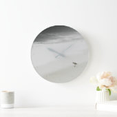 Kustzandloper op het strand grote klok (Huis)