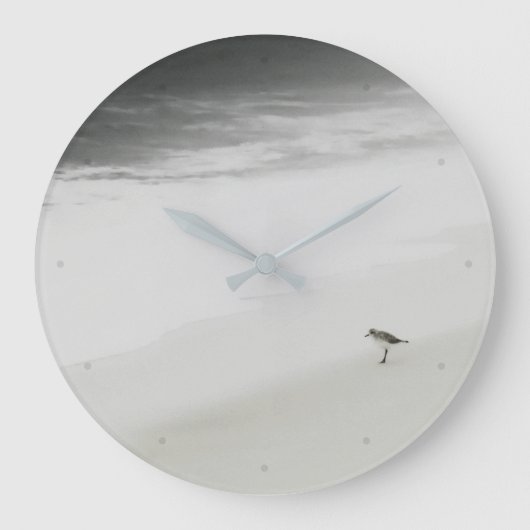 Kustzandloper op het strand grote klok (Voorkant)