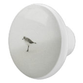 Kustzandloper op het strand keramische knop (Rechts)