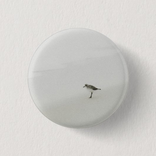 Kustzandloper op het strand ronde button 3,2 cm (Voorkant)