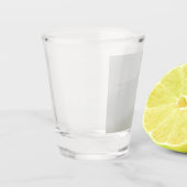 Kustzandloper op het strand shot glas (Links)