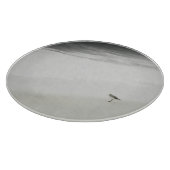 Kustzandloper op het strand snijplank (Hoek)