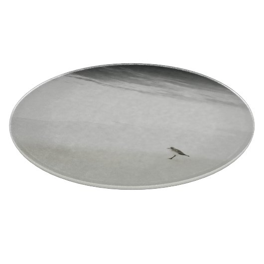 Kustzandloper op het strand snijplank (Hoek)