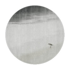 Kustzandloper op het strand snijplank