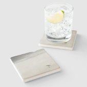 Kustzandloper op het strand stenen onderzetter (Zijkant)