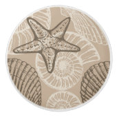 Kustzeesterren en schelpen in beige keramische knop (Voorkant)