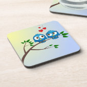 Kute blauwe vogels in de cartoon bier onderzetter (Linkerzijde)