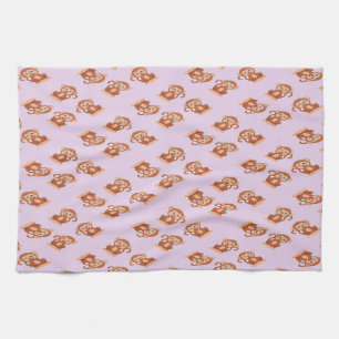 Kute bruine aap op paars theedoek
