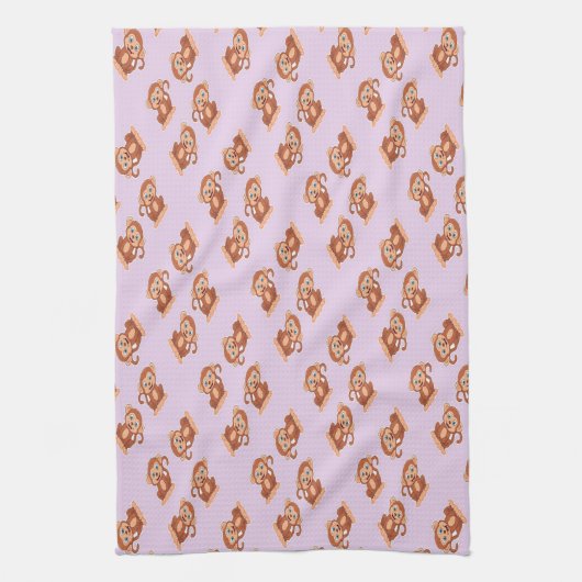 Kute bruine aap op paars theedoek (Verticaal)