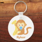 Kute Cartoon Baby aap met Banana Sleutelhanger (Voorkant)