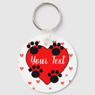 Kute dog schildert afdrukken en rood hart met aang sleutelhanger