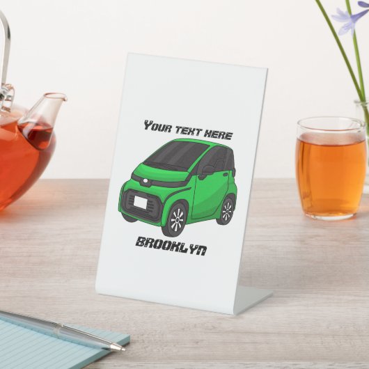Kute groene micromaatwagen reclamebord met voetstuk (Insitu)