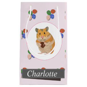 Kute hamster die een paaseieren houdt klein cadeauzakje