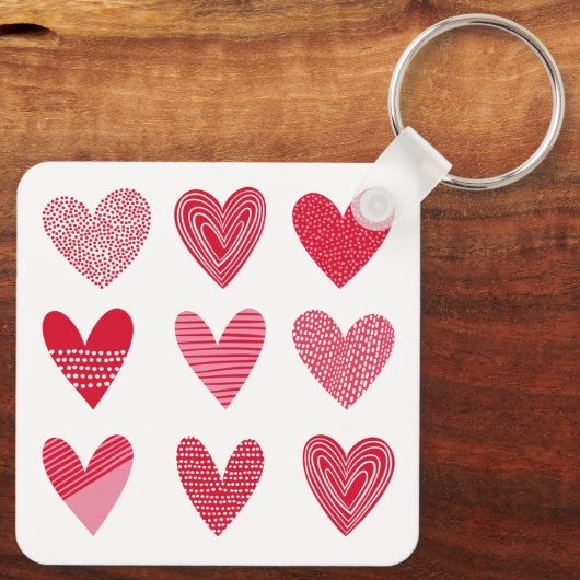 Kute harten in rood en roze met tekst sleutelhanger (Achterkant)